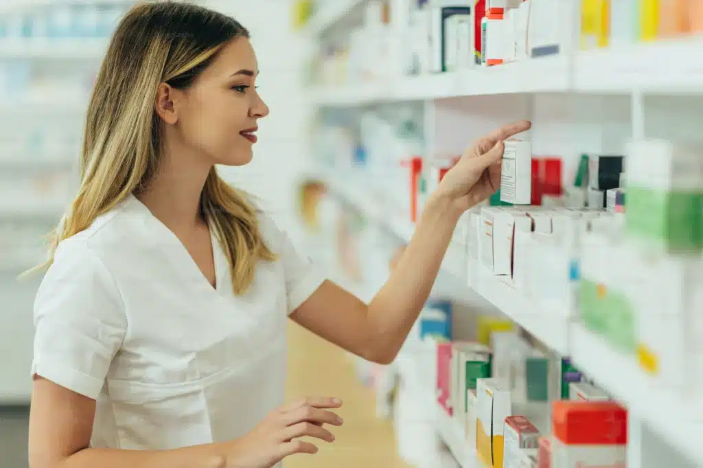 Pharmacy at the University of Alberta - girl reaching medication